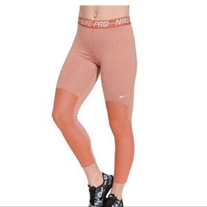 Nike Pro Leggings for Women size M. Pretty Burnt Orange color.